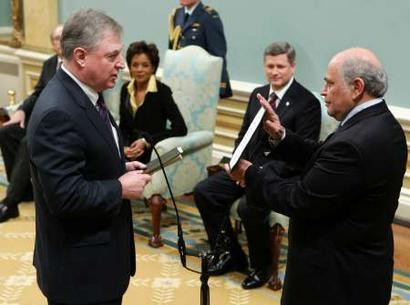 David Emerson is sworn in as Minister of International Trade.  &copy; 2006 Reuters.